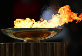 Олимпийский огонь доставили в Южную Корею
