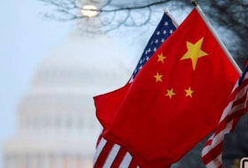 Глава МИД Китая: Торговая война США нарушает правила ВТО