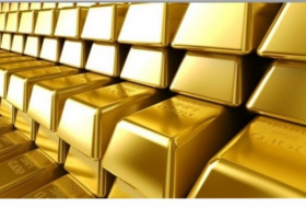Цена золота понизилась на 5 долларов