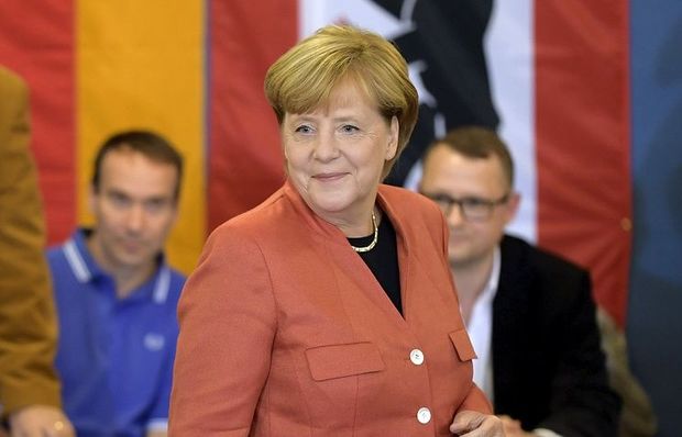 Экзитпол: Меркель побеждает на выборах