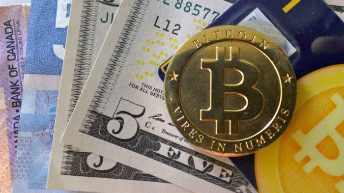 Биткоин превысил девять тысяч долларов