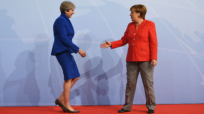 Мэй и Меркель договорились противостоять агрессии России