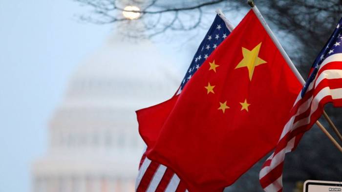 Глава МИД Китая: Торговая война США нарушает правила ВТО