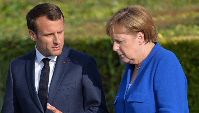 В Германии назвали возможные темы переговоров Меркель и Макрона
