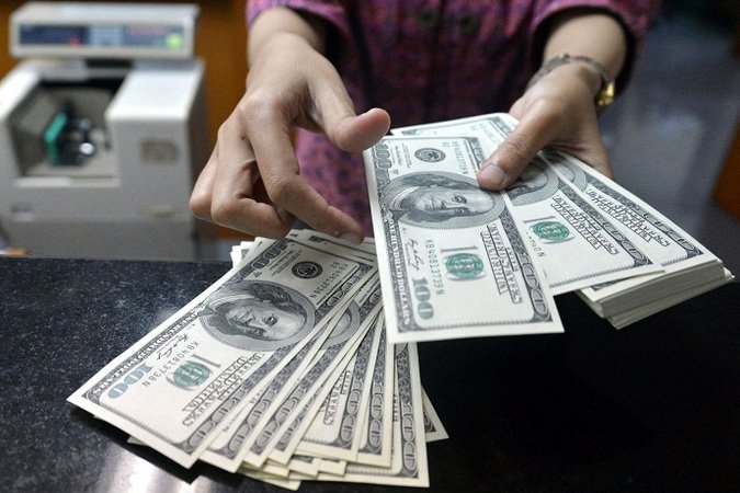 Назван срок отказа от доллара в расчетах с Китаем
