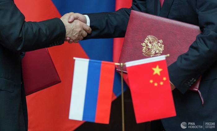 МИД Китая анонсировал подписание около 30 соглашений с Россией
