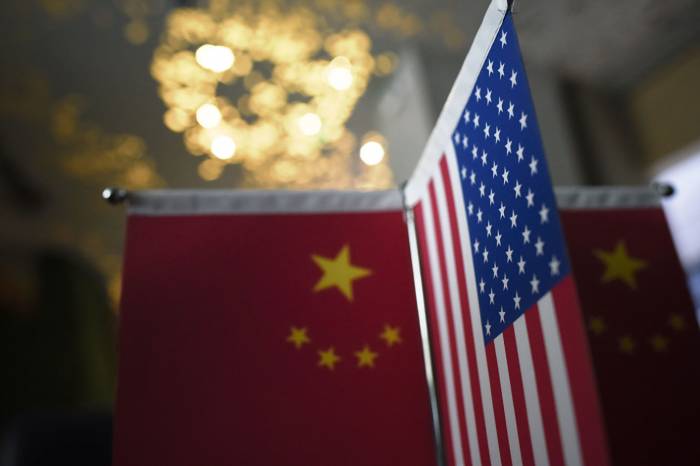 Китай выразил готовность биться до "победного конца" в торговой войне с США
