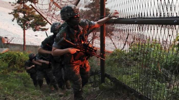 КНДР возвращает войска в демилитаризованную зону
