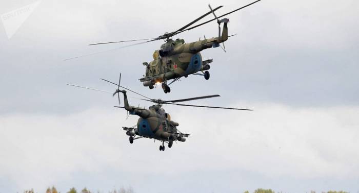 В Таджикистане российские вертолеты Ми отработали уход от ПВО противника