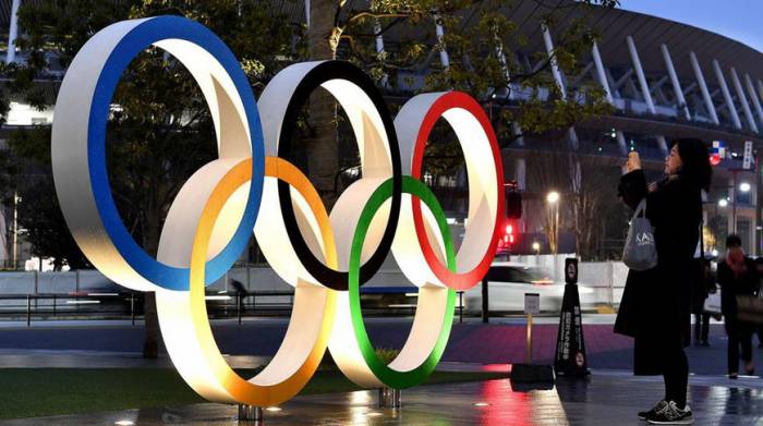 Японские города отказываются от приема олимпийцев