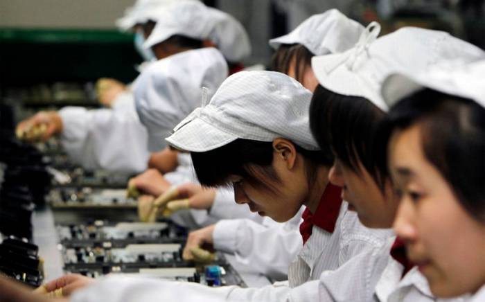 На заводе по производству iPhone в КНР рабочим выплатят отступные по $1400
