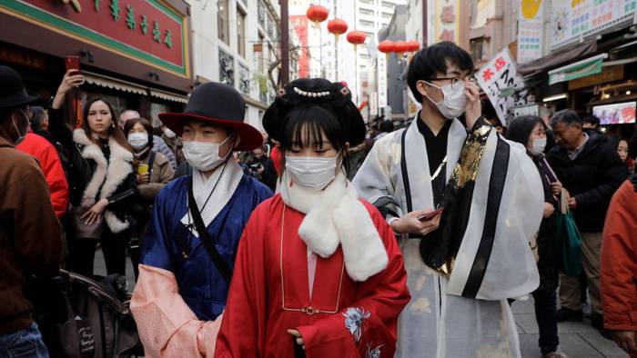 Япония вводит обязательное тестирование на коронавирус для прибывающих из Китая
