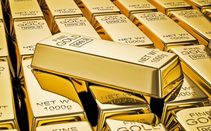 Золото подешевело на ожиданиях новостей по повышению лимита госдолга США
