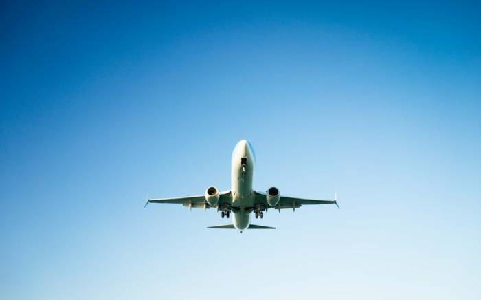 Пассажир следовавшего в Южную Корею самолета попытался открыть дверь в воздухе
