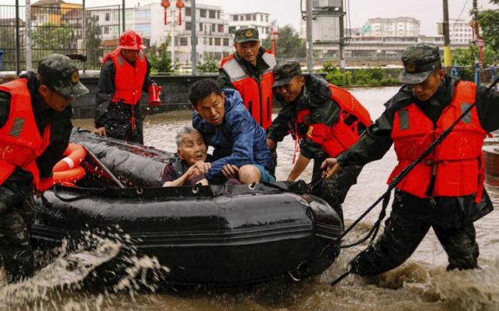 Число жертв наводнения в Пекине возросло до 33
