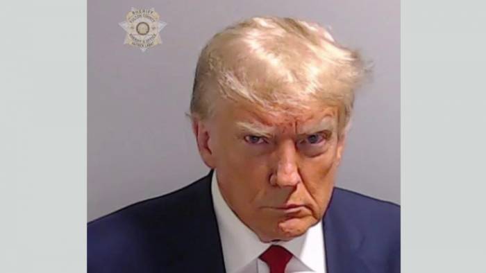Трамп собрал 7 млн долларов после фото в тюрьме
