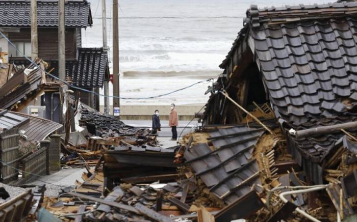 Число погибших при землетрясении в Японии выросло до 215
