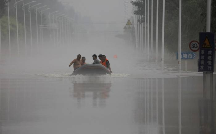 В Китае объявили высокий и высший уровень опасности из-за сильных ливней
