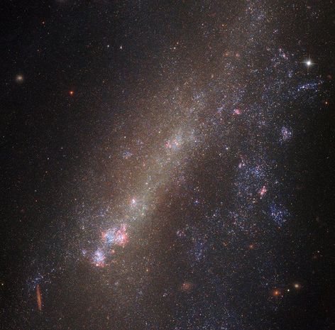 Снимок разорванной галактики от НАСА