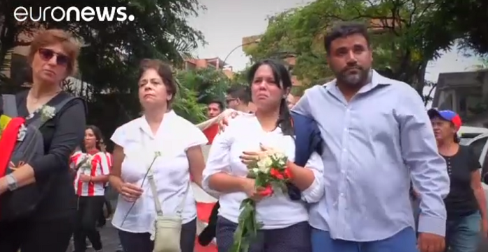 Euronews: В Каракасе почтили память погибших манифестантов (ВИДЕО)
