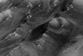NASA показало водные каньоны на Марсе