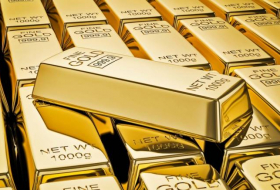 Золото подешевело на ожиданиях новостей по повышению лимита госдолга США
