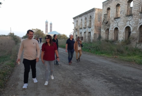 Международные путешественники ознакомились в Агдаме со следами армянского вандализма