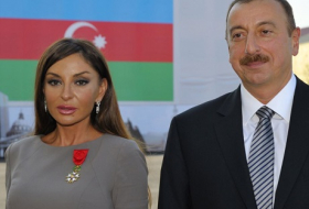 Ильхам Алиев и его супруга на церемонии открытия новой дороги в Баку 